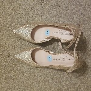 Gold shoes in size 8.5